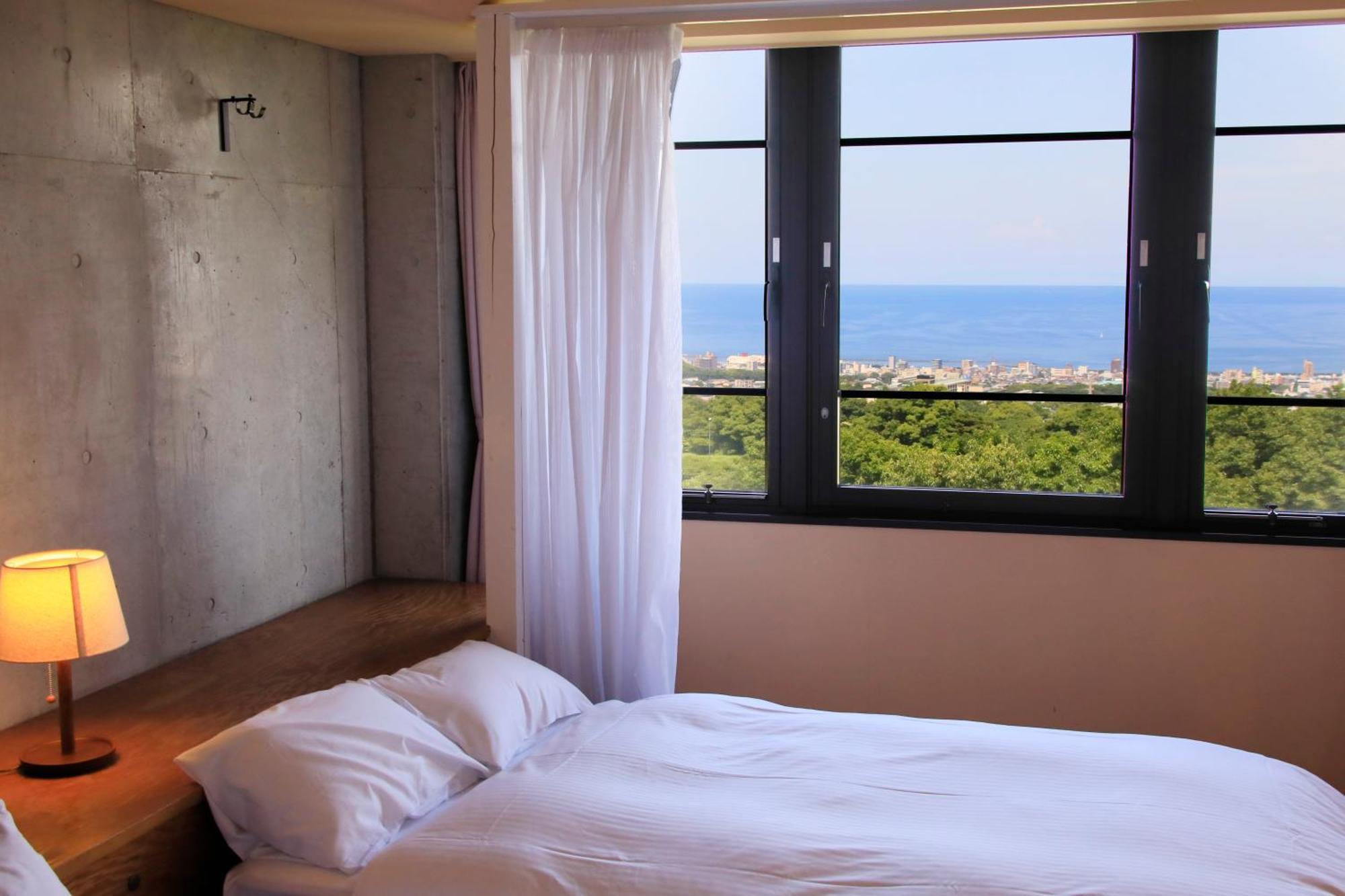 Hotel Beppu Fuga Habitación foto